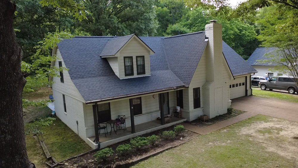 Completed roof replacement on a home near Olive Branch, MS by Lifetime Roofing & Services